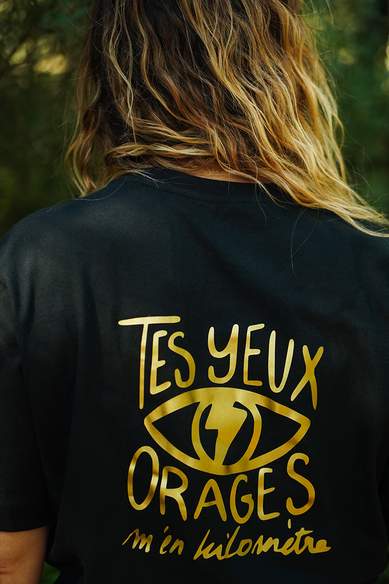 t-shirt-noir-tes-yeux-orages-m-en-kilometre-or